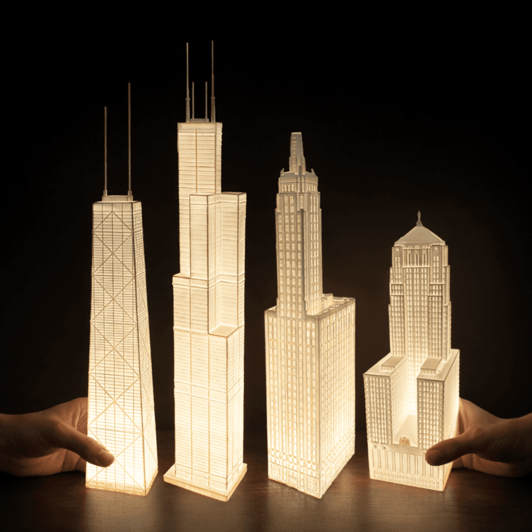A collection of ZedPrints skyline lamps glowing together